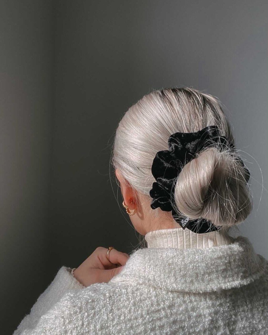 Sleek Low Bun with a Velvet Scrunchie - fall hairstyles for black women