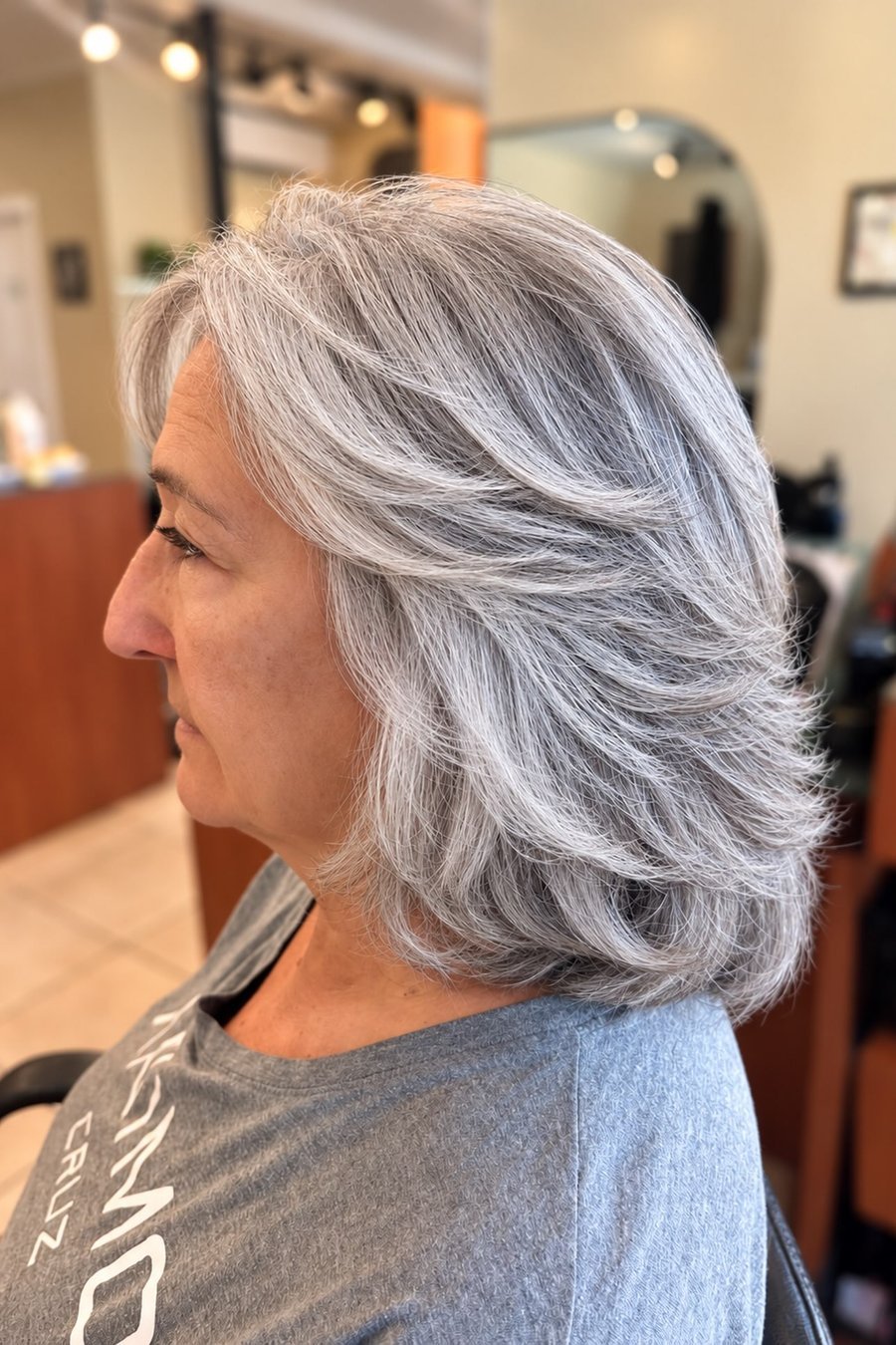 Soft Shoulder-Length Waves medium length hairstyle for women over 70