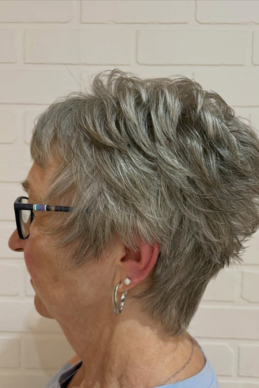 Layered Pixie - low maintenance short grey hairstyles for women