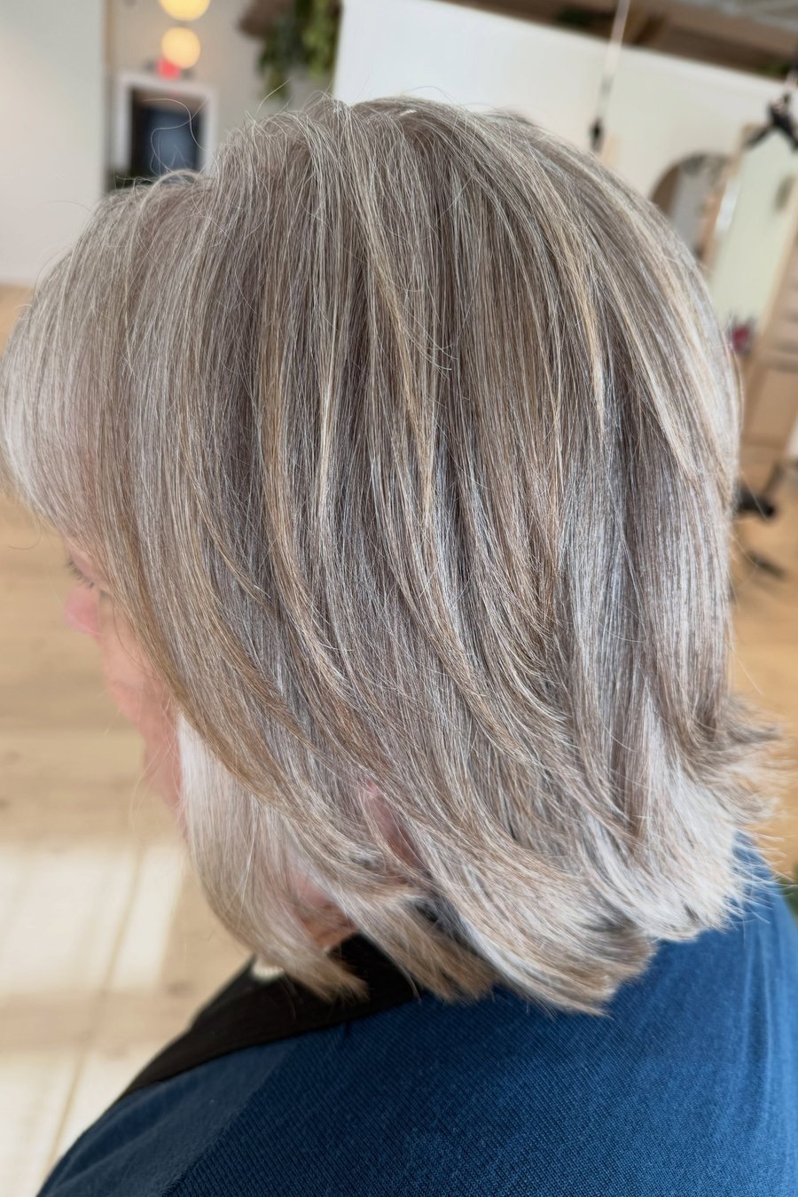 Soft Silver Shoulder-Length Layers medium length hairstyle for women over 70