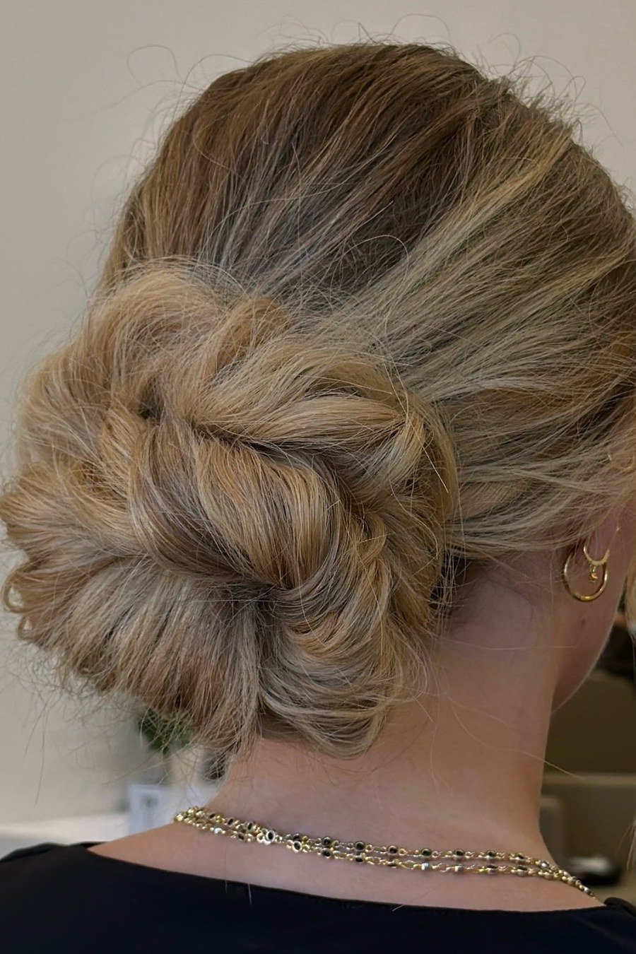 Textured Low Bun — easy updo for wedding guest hairstyle