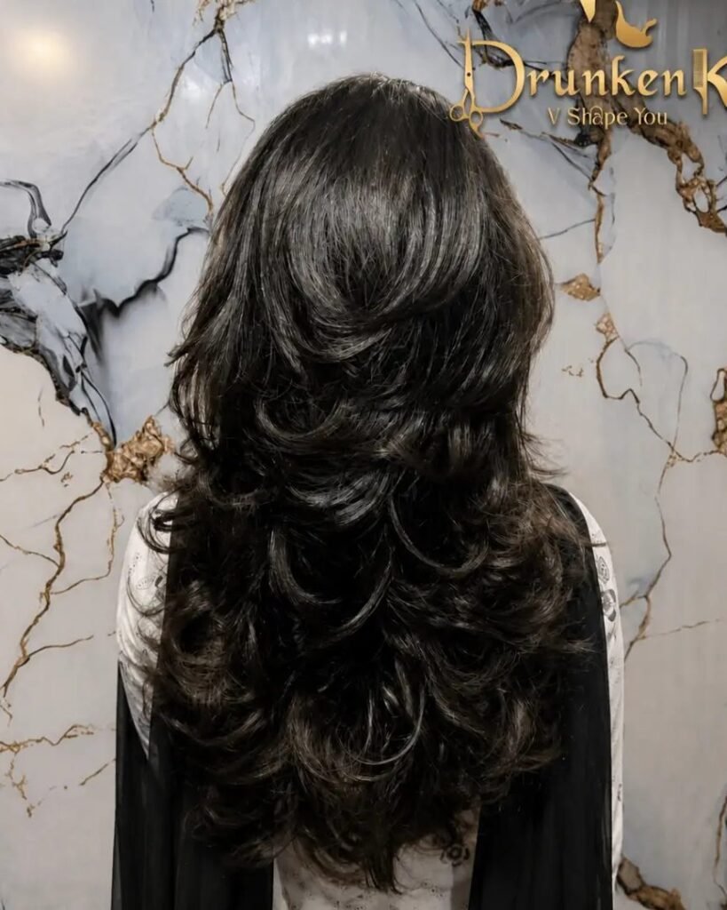 V-cut layers - long layered haircut for women over 50
