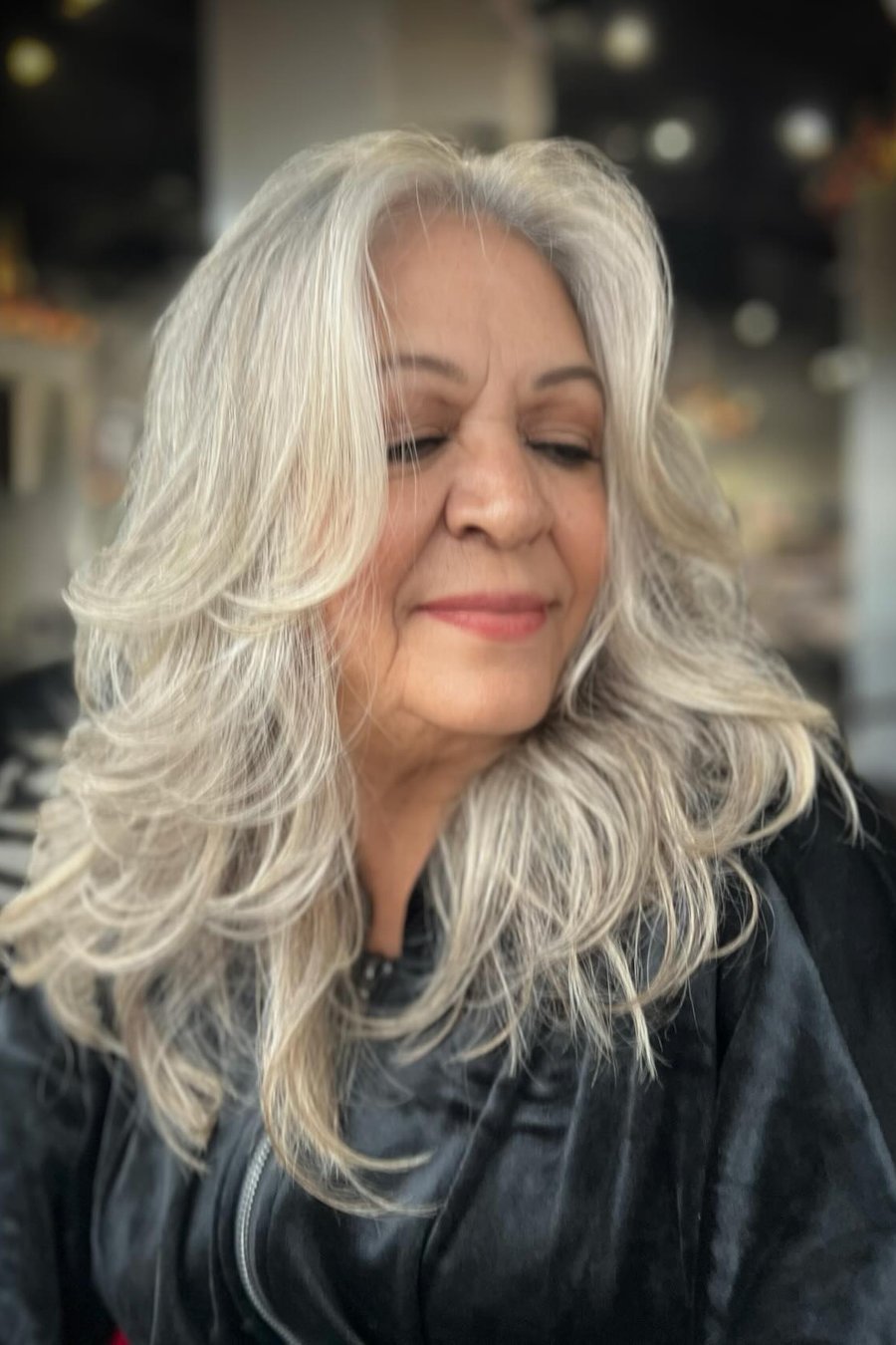 Medium-Length Silver Waves medium length hairstyle for women over 70