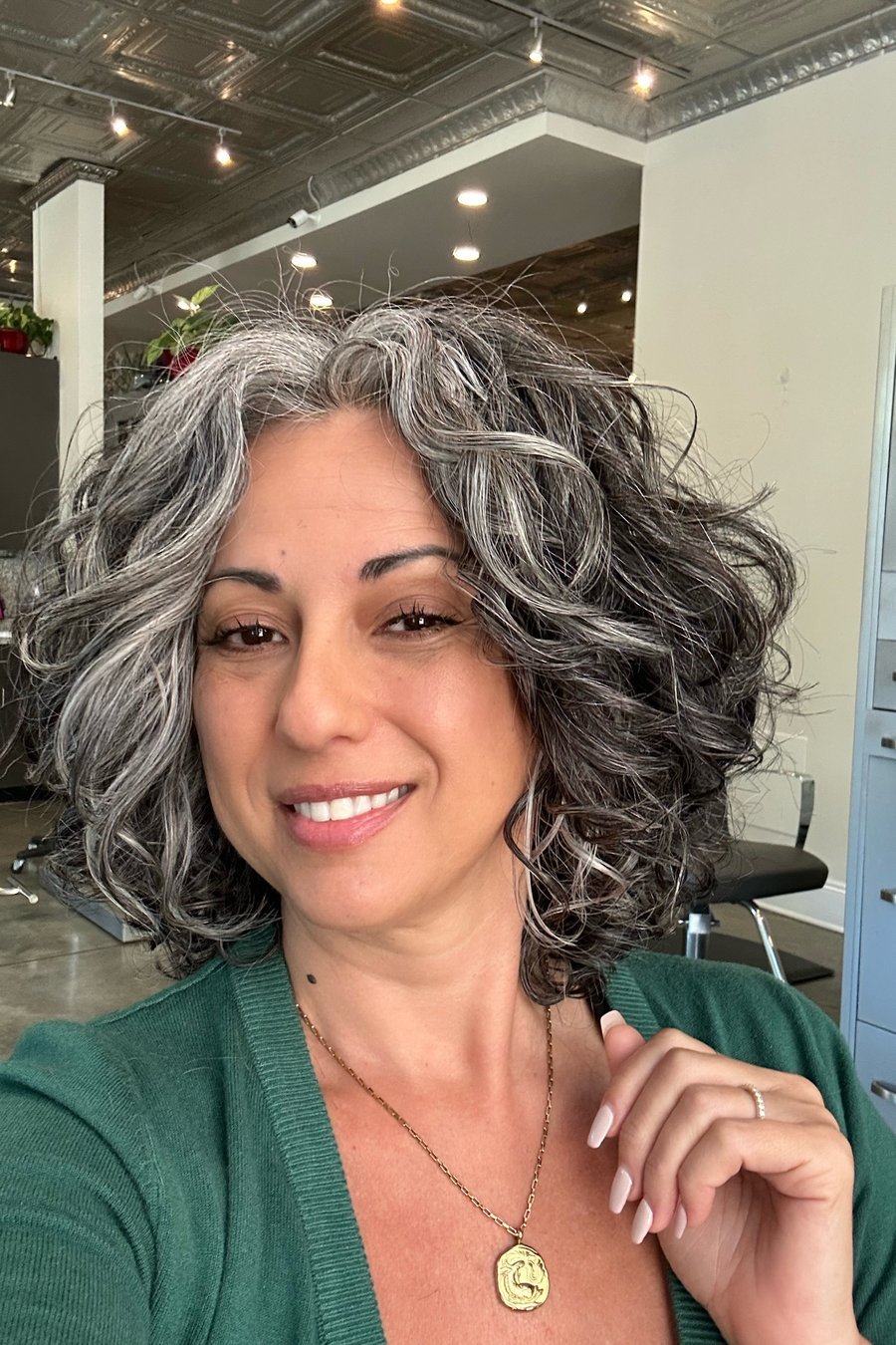 Tousled Curly Layers medium length hairstyle for women over 70