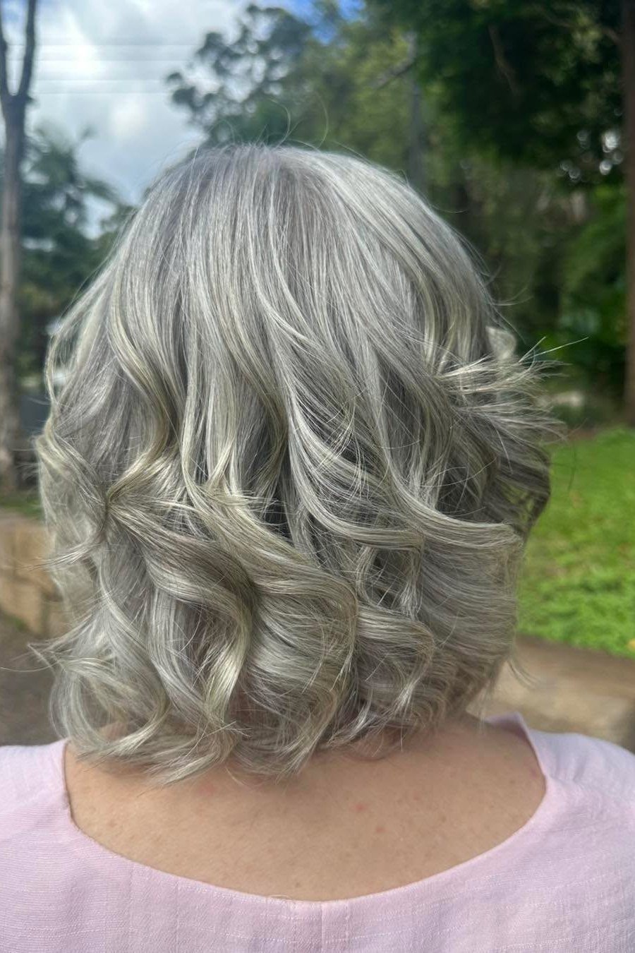 Wavy Bob - low maintenance short grey hairstyles for women
