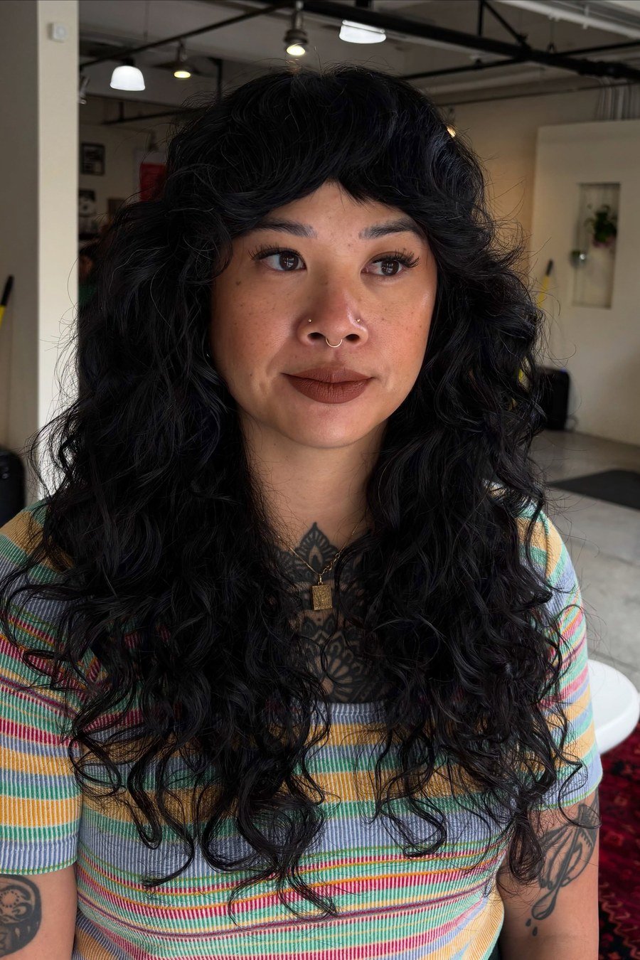 Textured Curly Shag with Curtain Bangs - curly hairstyles