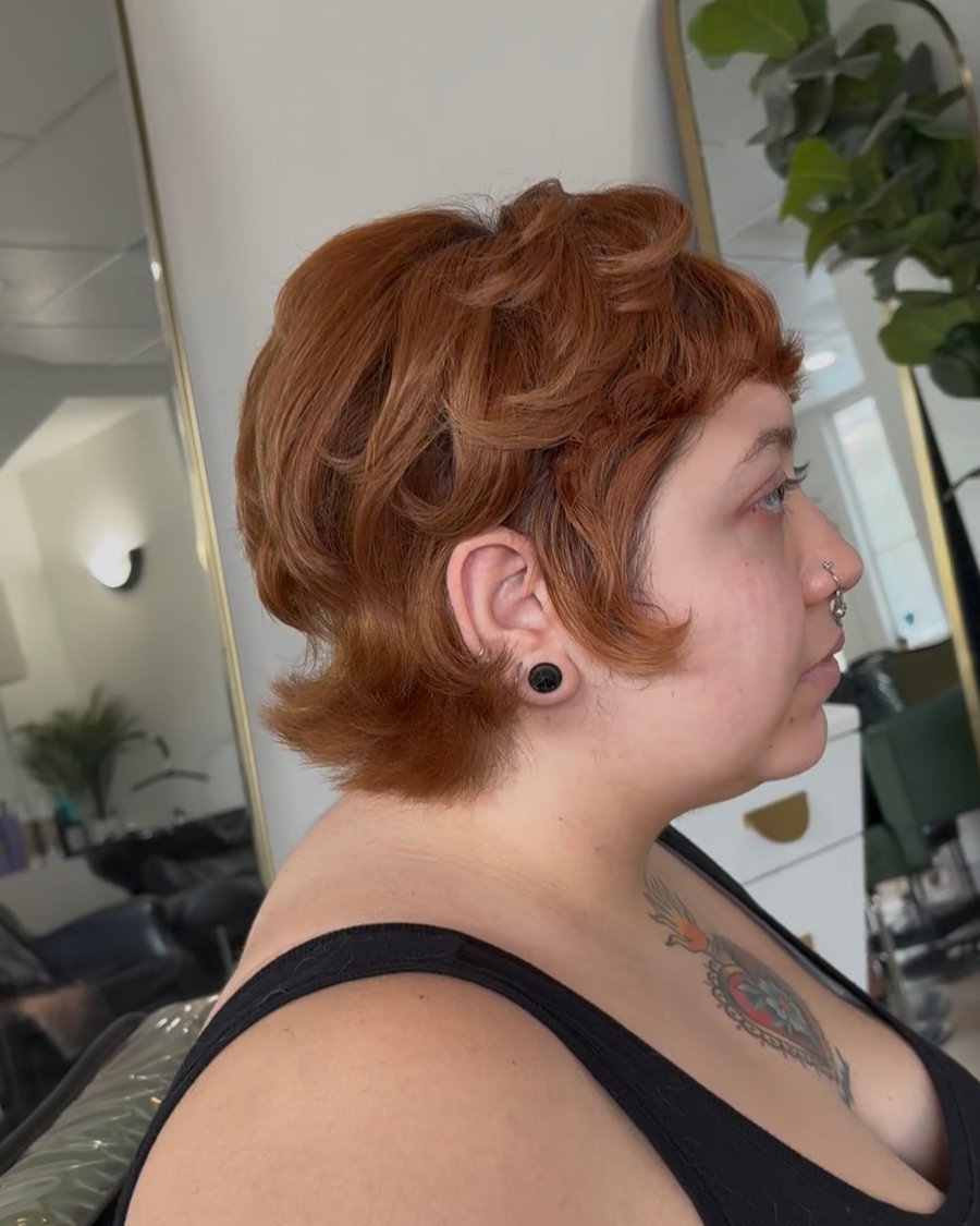 Wavy copper long pixie cut