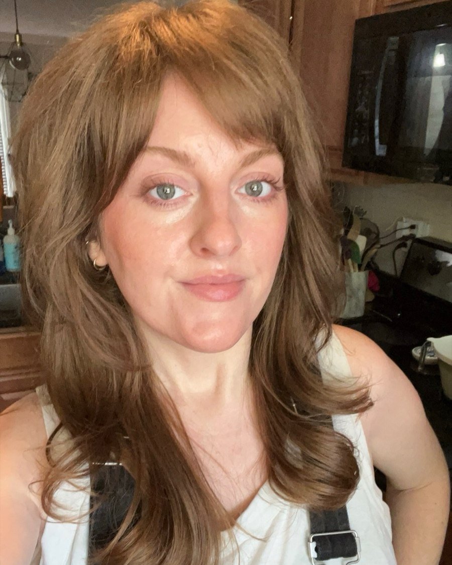 Wispy Bangs with Medium Layers womens haircut