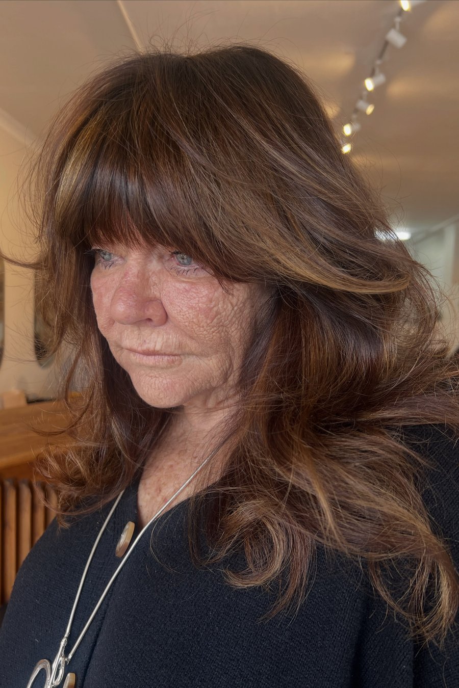 Textured Mid-Length Layers medium length hairstyle for women over 70