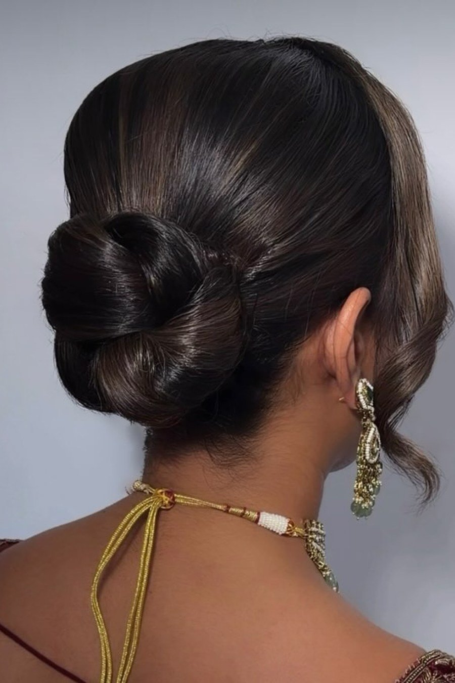 Knotted Low Bun — easy updo for wedding guest hairstyle