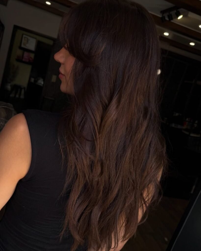 Long wolf-inspired layers - long layered haircut for women over 50
