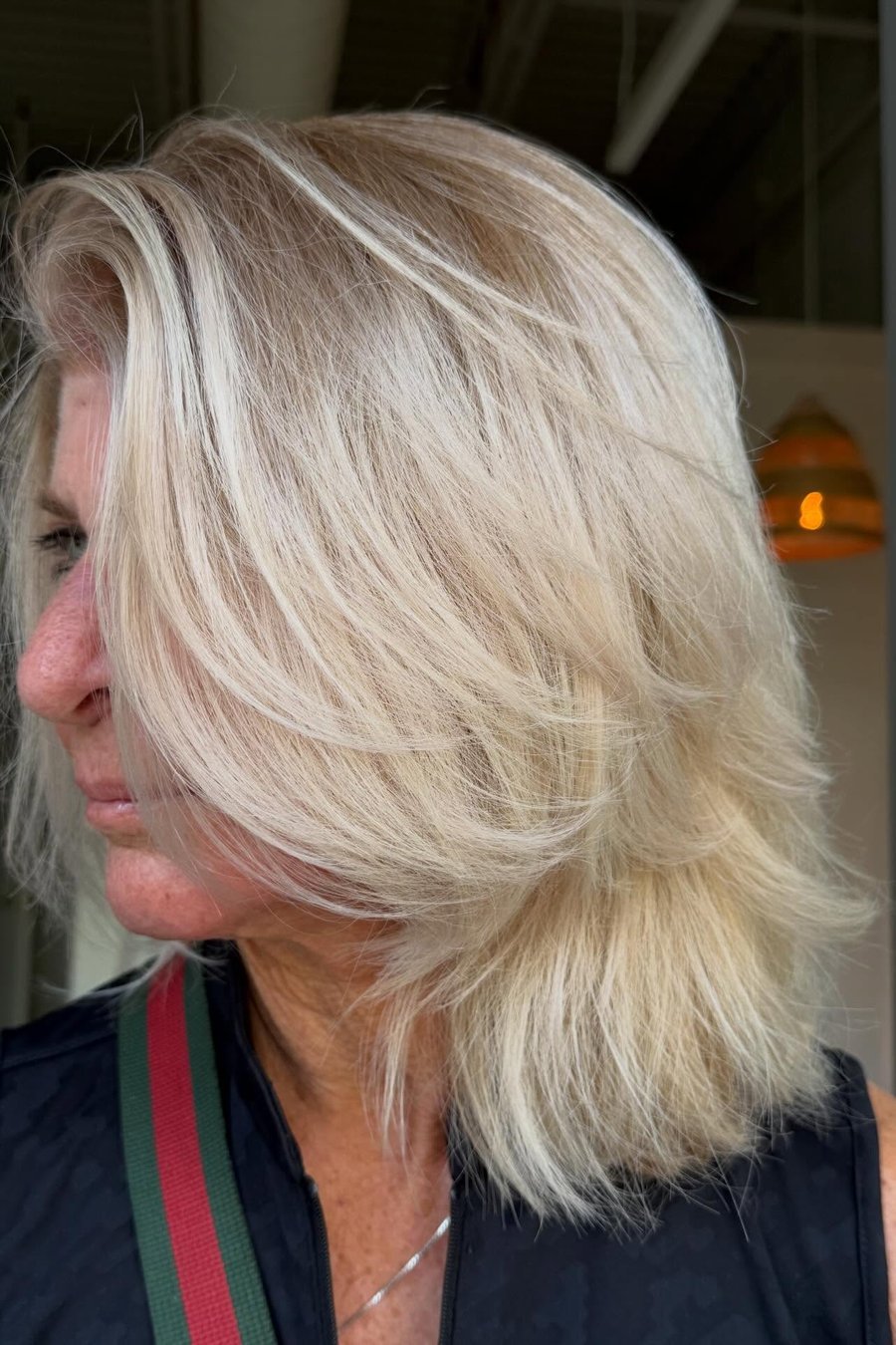 Side-Parted Highlighted Lob medium length hairstyle for women over 70