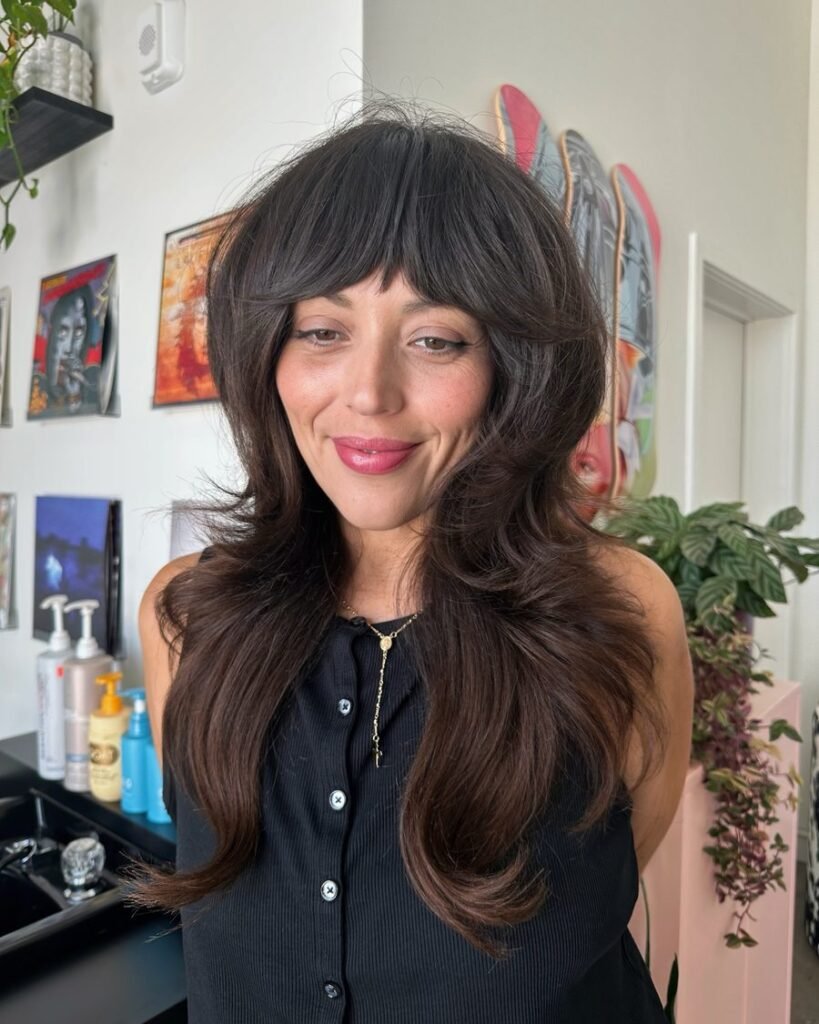 Curtain bangs + layers - long layered haircut for women over 50