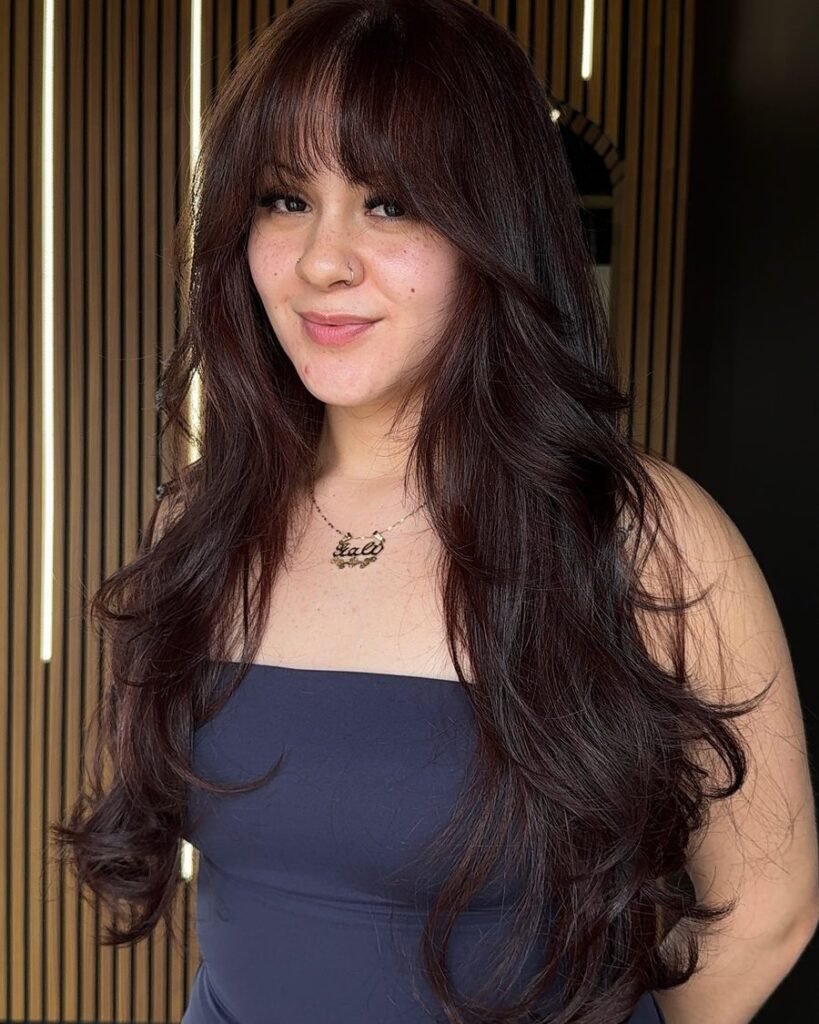 Wispy bangs + layers - long layered haircut for women over 50