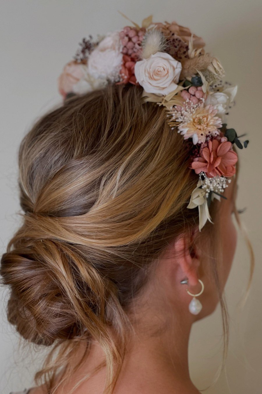Boho Bun with Fresh Flowers — easy updo for wedding guest hairstyle