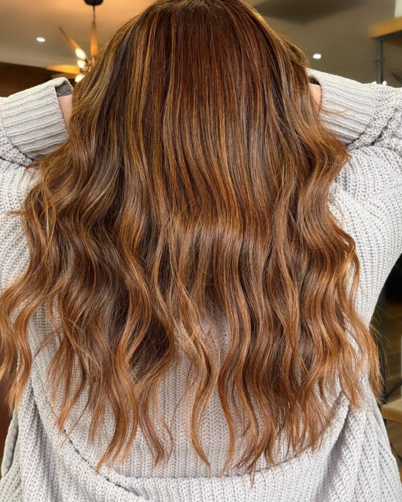 Burnished brunette fall hair color 2026