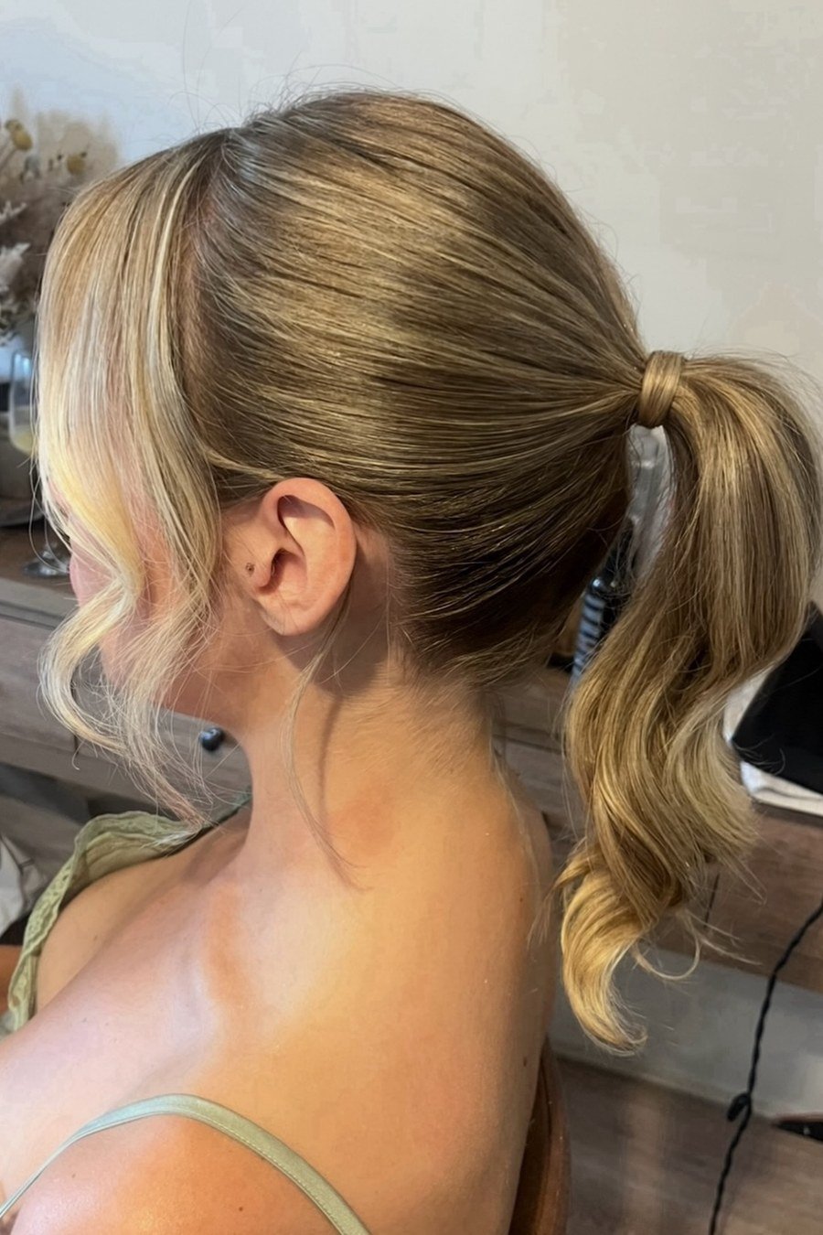 Low Ponytail with Wrapped Base bridesmaid hairstyle