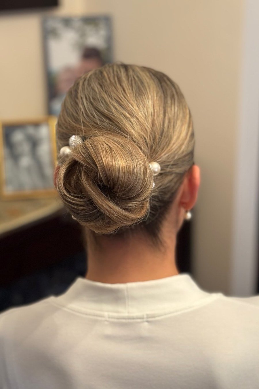 Pearl-Pin Low Bun — easy updo for wedding guest hairstyle