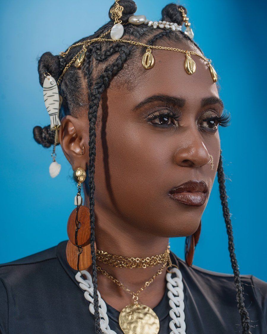 Bantu Knot Updo with Gold Accessories - fall hairstyles for black women