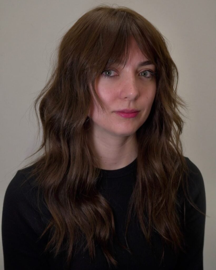 Birkin bangs - long layered haircut for women over 50