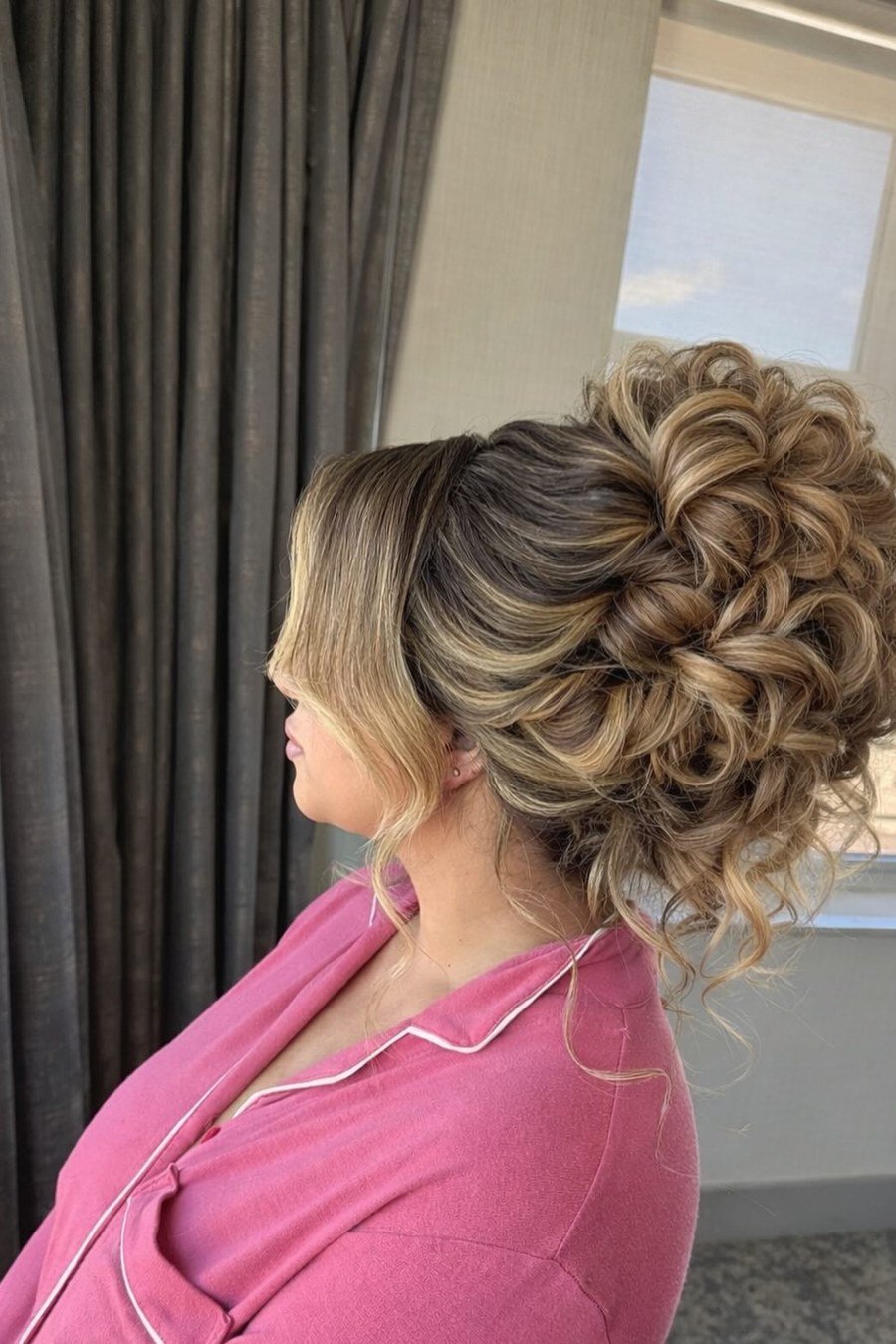 Voluminous Piled-Up Curly Updo - curly hairstyles
