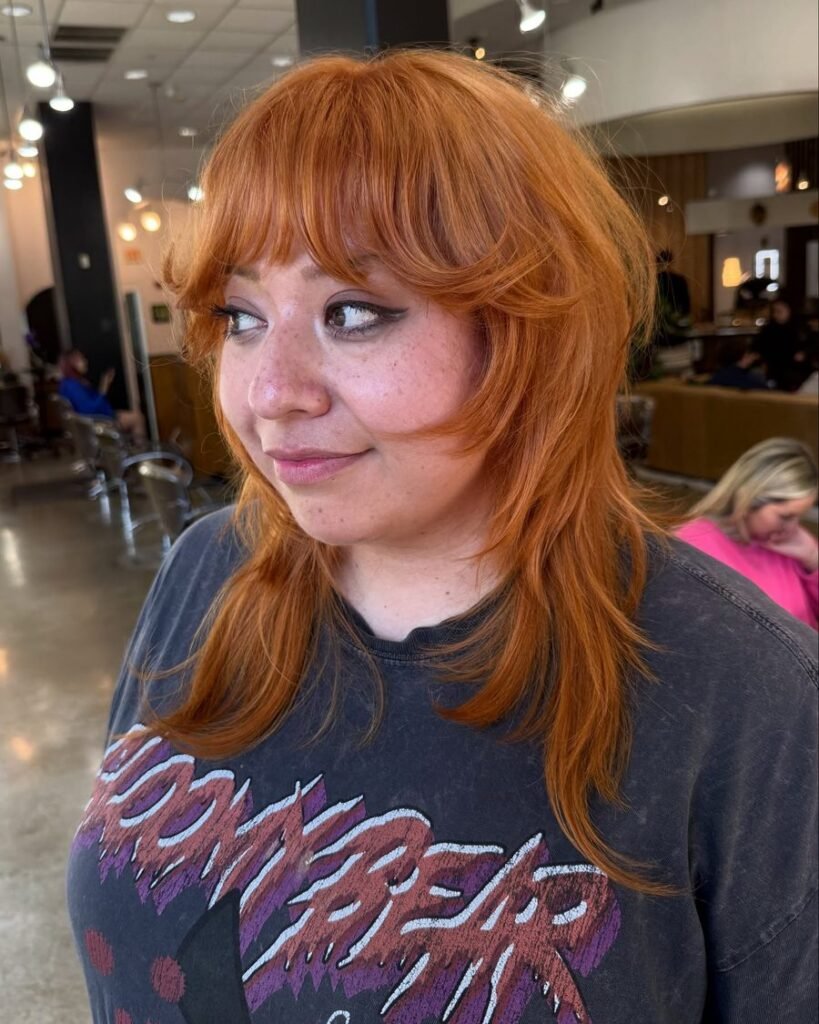Bottleneck bangs - long layered haircut for women over 50