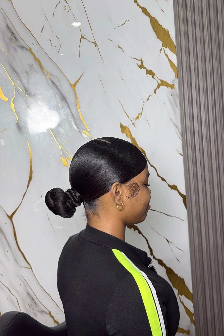 Low Sleek Bun hairstyle for black women