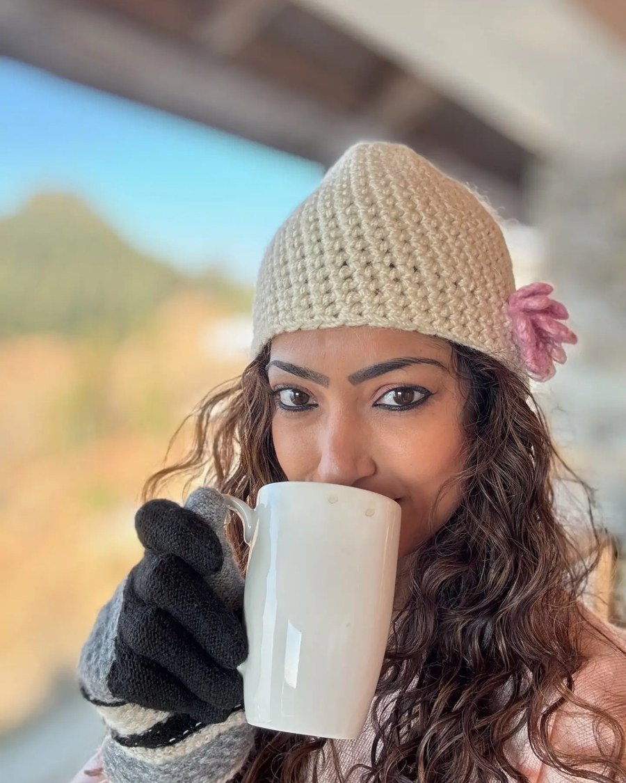 The Side-Swept Ponytail - beanie hairstyles