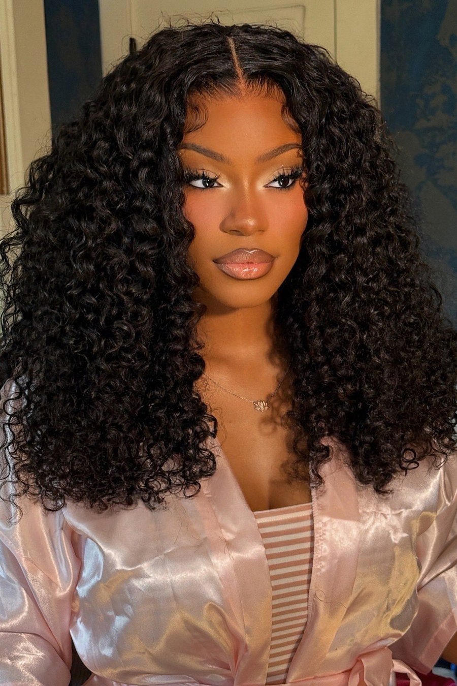 Middle-Part Voluminous Curls - curly hairstyles
