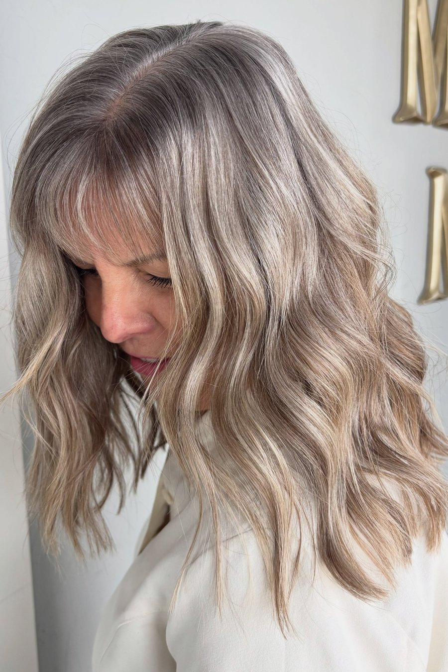 Long Bob with Piecey Bangs medium length hairstyle for women over 70