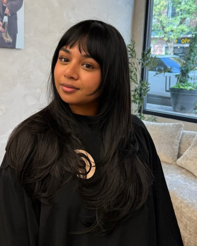 Piecey bangs - long layered haircut for women over 50