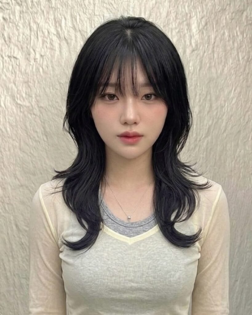 See-through bangs - long layered haircut for women over 50