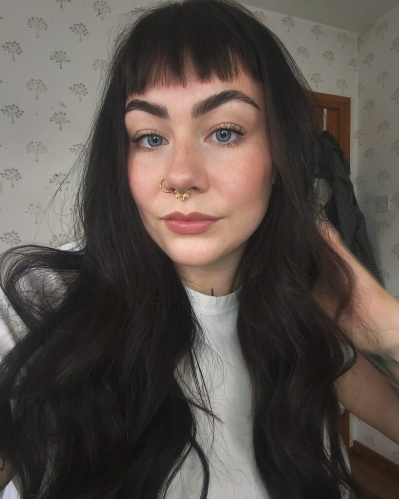 Full bangs on thick hair - long layered haircut for women over 50