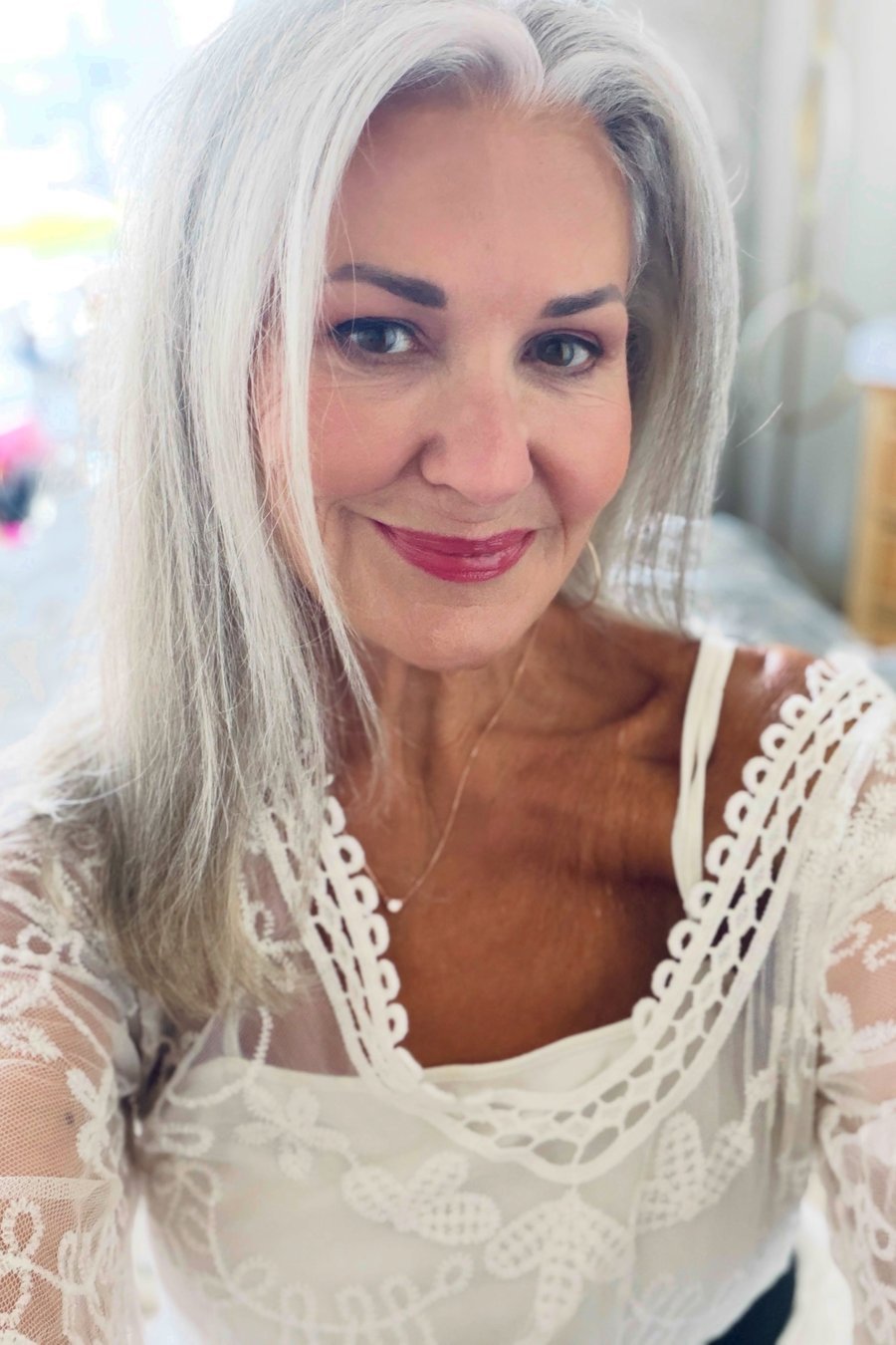 Face-Framing Wavy Lob medium length hairstyle for women over 70