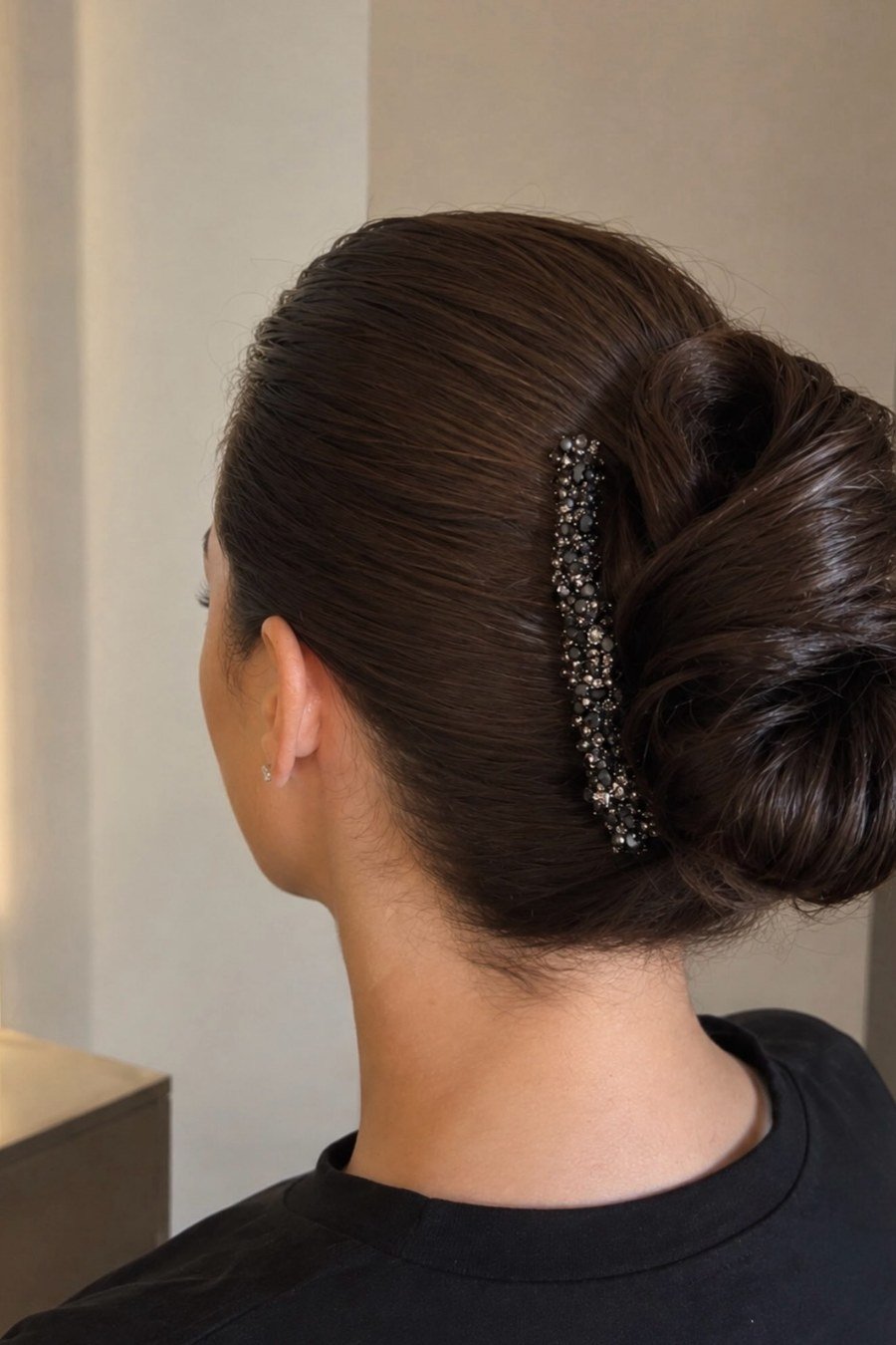 Statement-Clip Low Updo — easy updo for wedding guest hairstyle