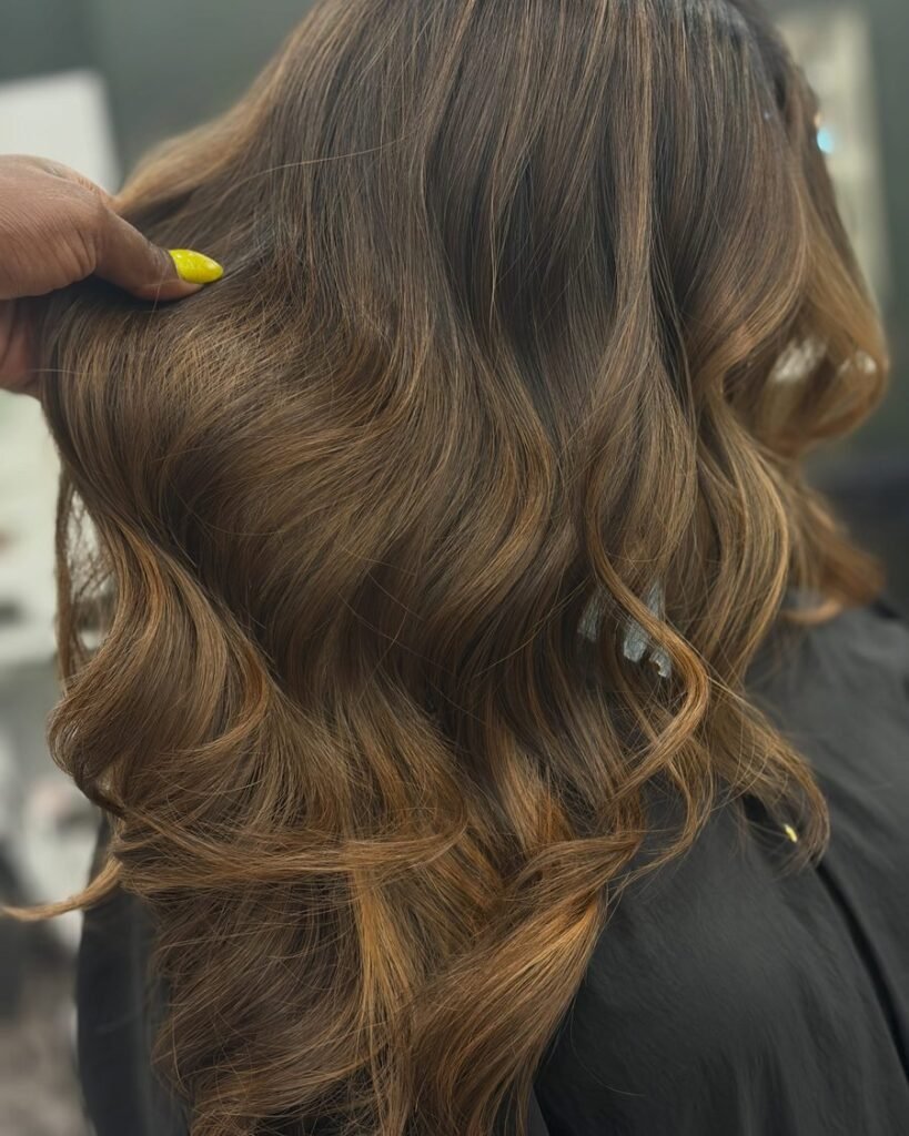Caramel balayage layers - long layered haircut for women over 50