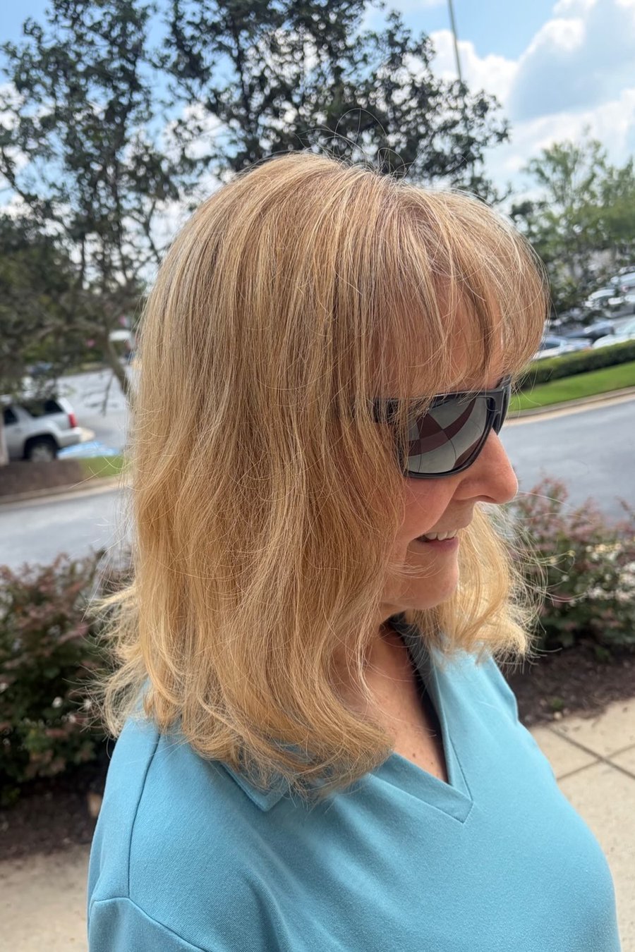 Medium Cut with Curtain Bangs medium length hairstyle for women over 70