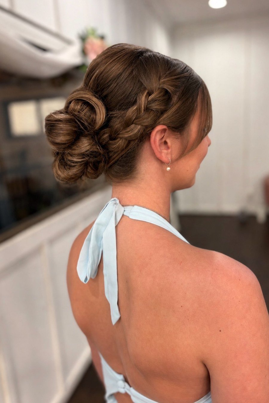 Side Bun with Braid Detail bridesmaid hairstyle