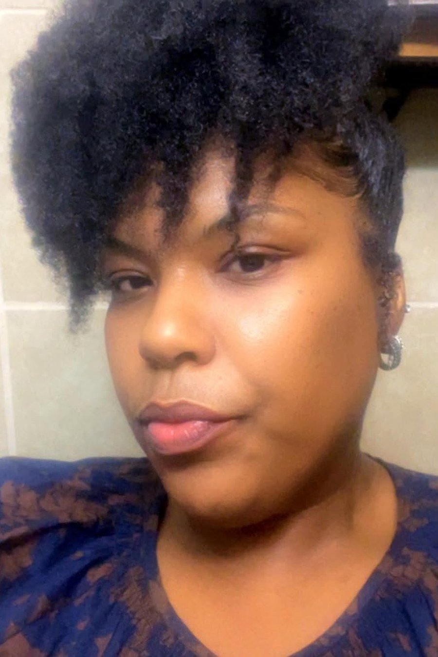 Curly High Puff Updo bridesmaid hairstyle