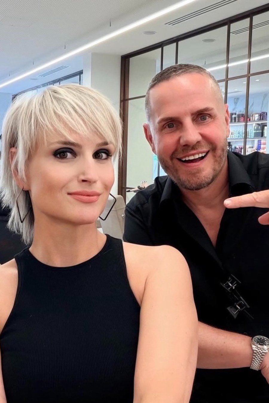 Platinum Pixie with Feathered Top mom haircut idea