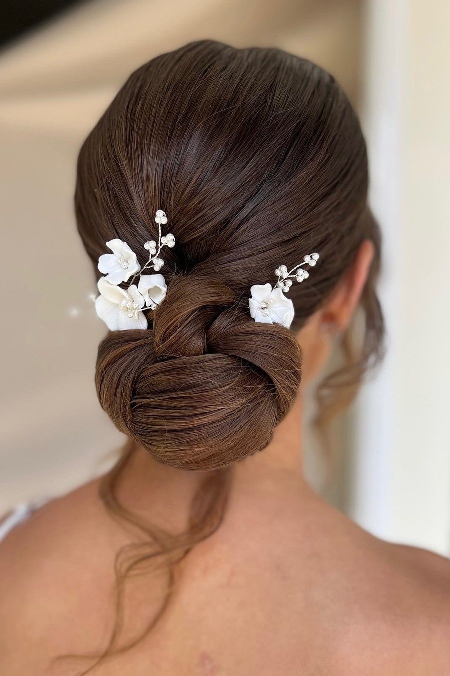 Romantic Updo with Floral Pins bridesmaid hairstyle