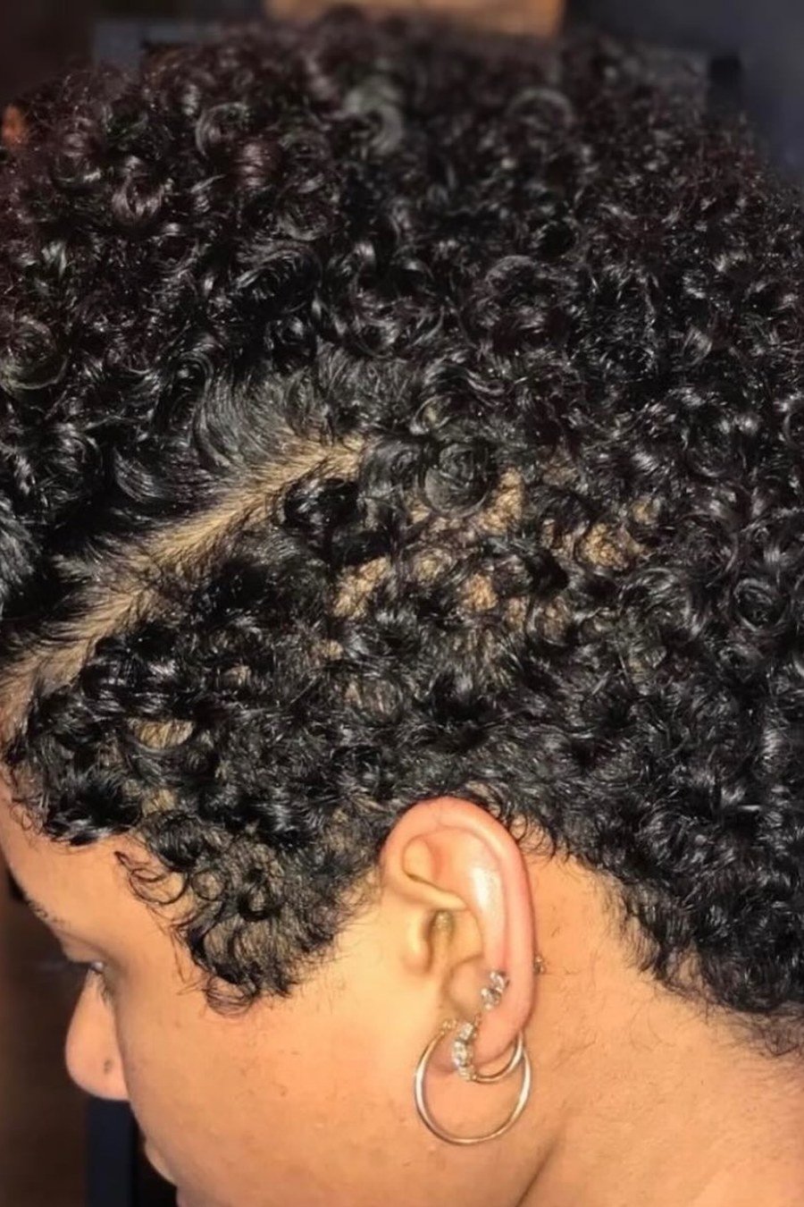 Tapered Curly Pixie with Volume on Top — edgy short curly haircuts