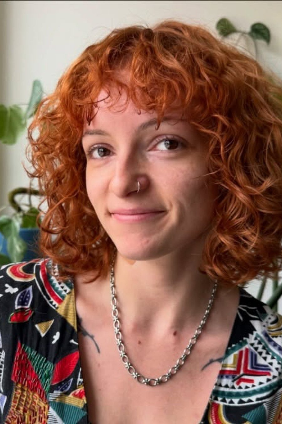 Curly Bob with Vibrant Red Color — edgy short curly haircuts