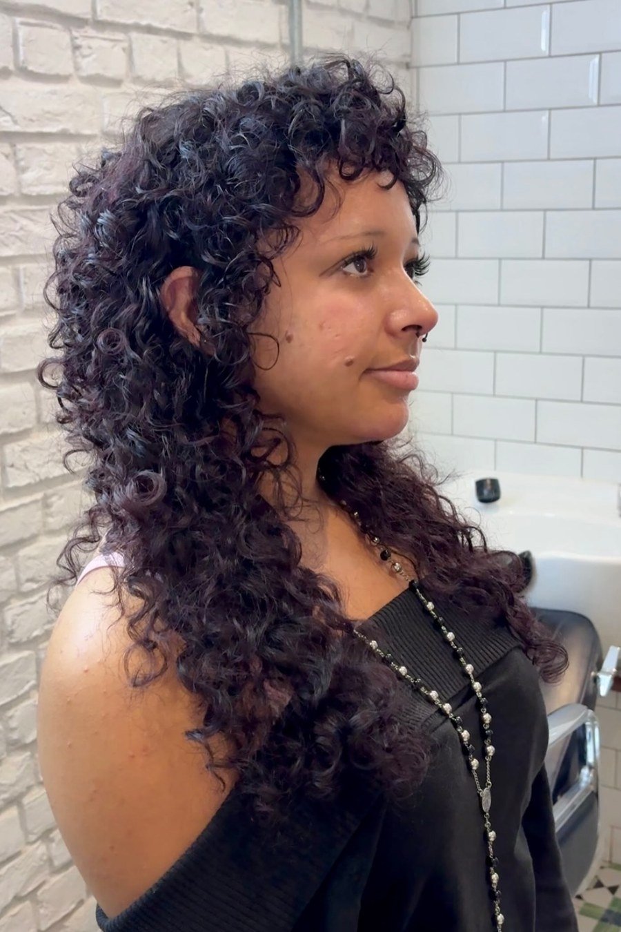Short Curly Wolf Cut — edgy short curly haircuts