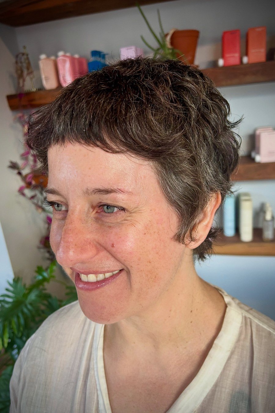Curly Pixie with Micro Bangs — edgy short curly haircuts