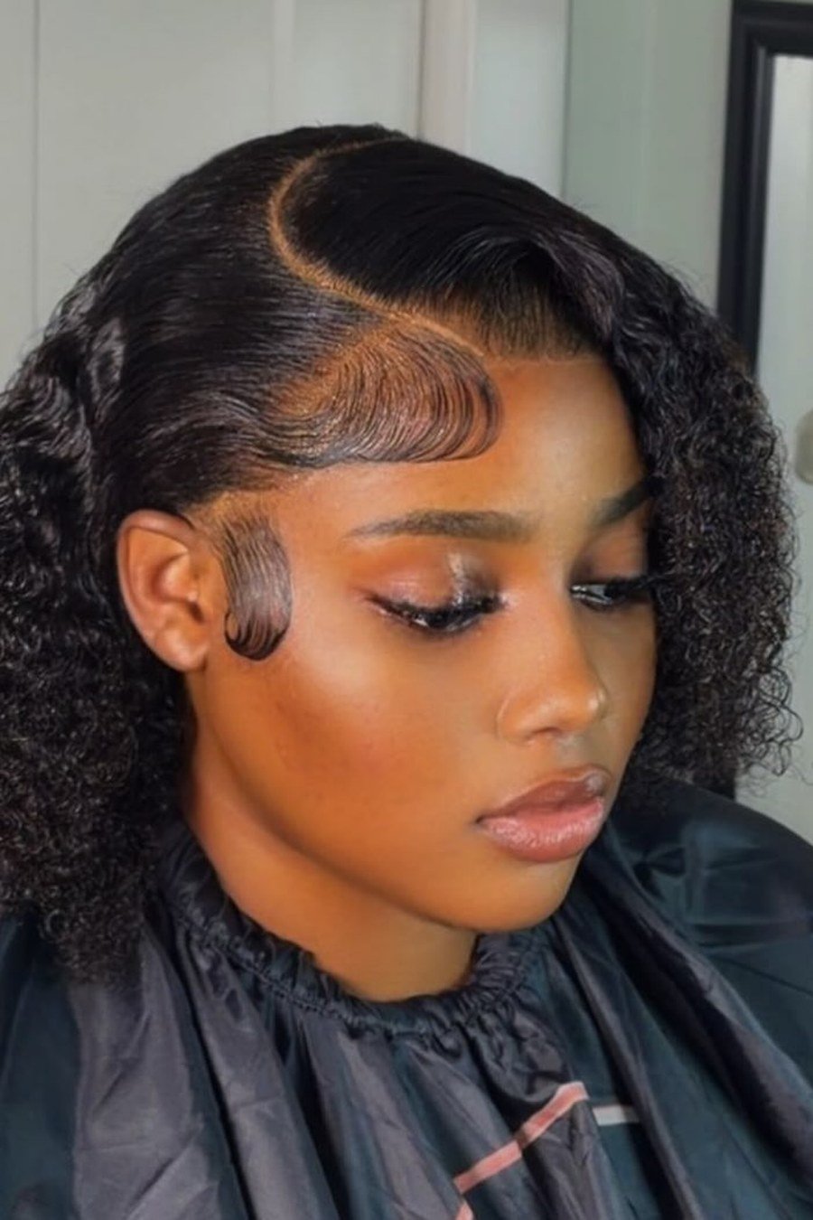Edgy Curly Bob with Deep Side Part — edgy short curly haircuts
