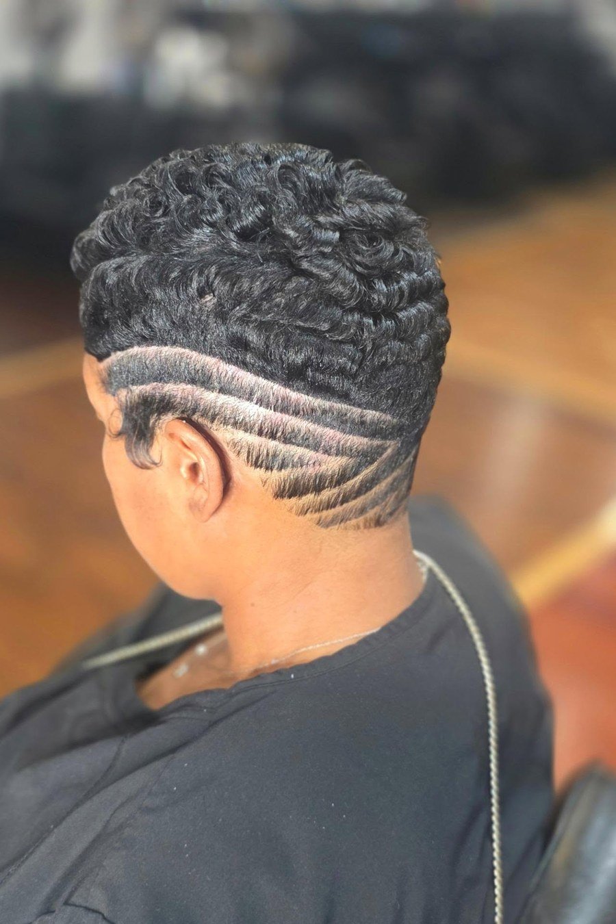 Curly Pixie with Shaved Nape Design — edgy short curly haircuts