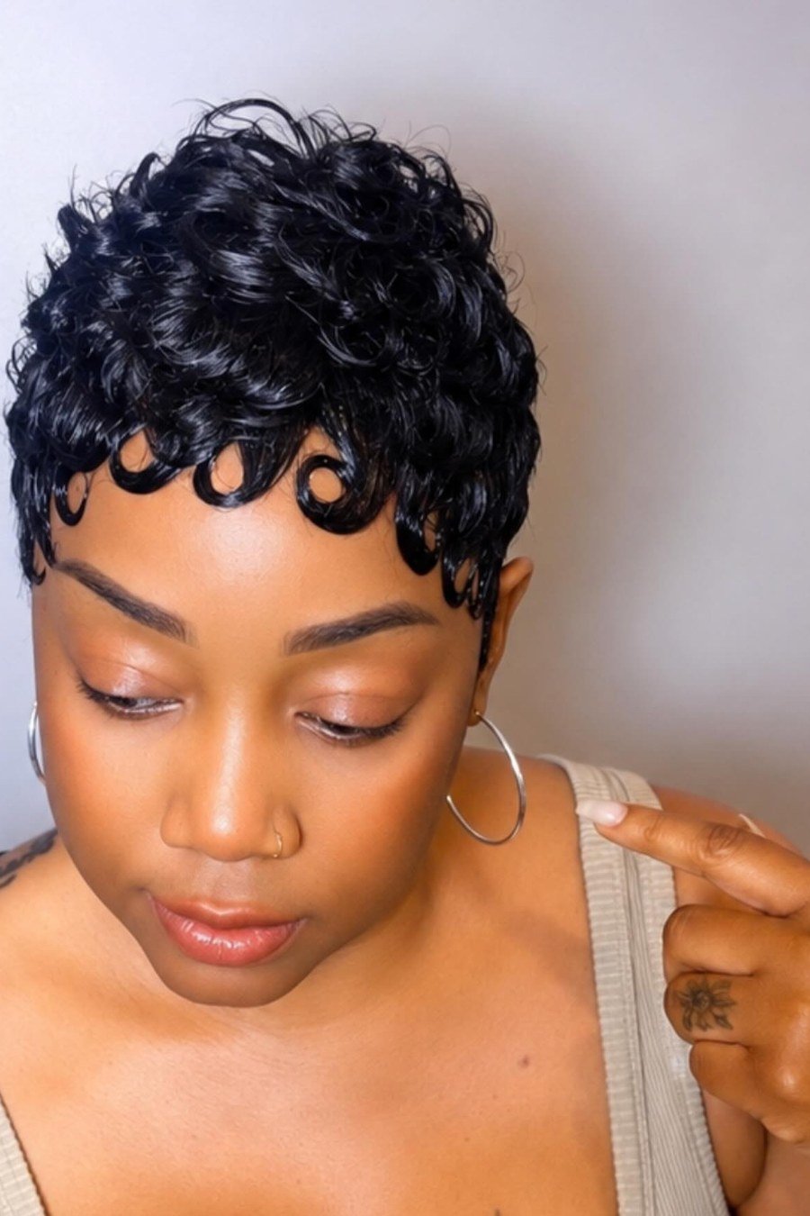 Tapered Curly Cut with Curly Bangs — edgy short curly haircuts