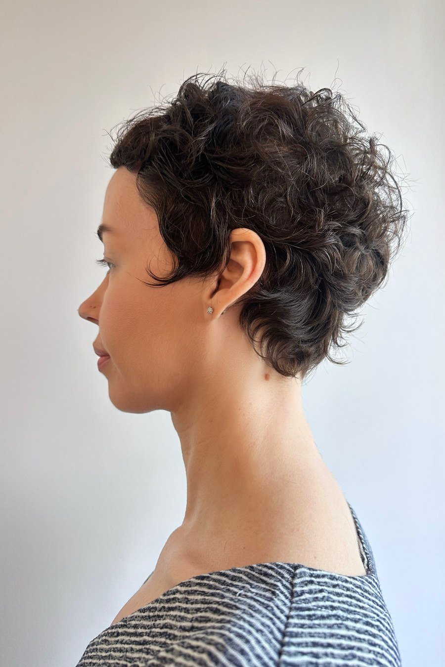Tousled Curly Pixie with Razor Texture — edgy short curly haircuts