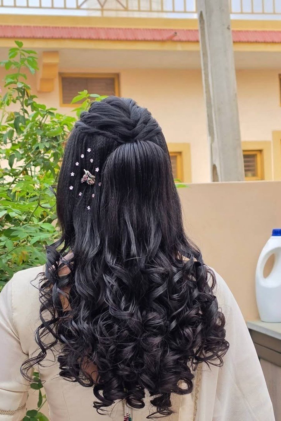 Curly Half-Up — half up half down hairstyles for women
